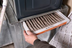 Furnace tune-up and filter change for fall home preparation